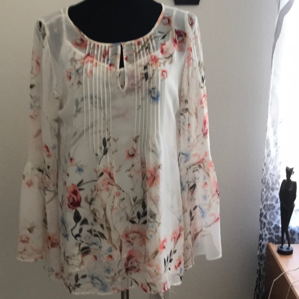 Bell sleeved top